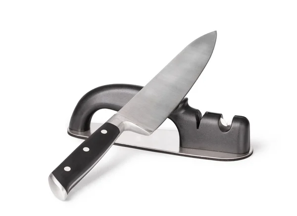 Grindstone and knife — Stock Photo, Image