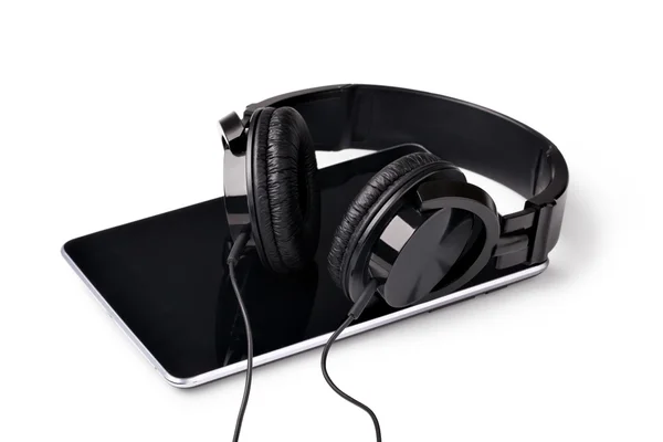 Tablet with headphones — Stock Photo, Image