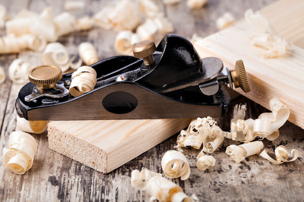 wooden plane and shaving