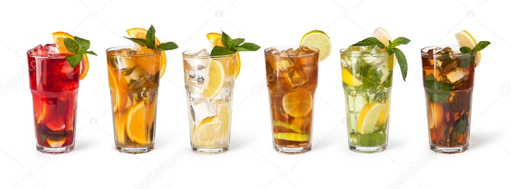 Glasses of fruit drinks with ice cubes