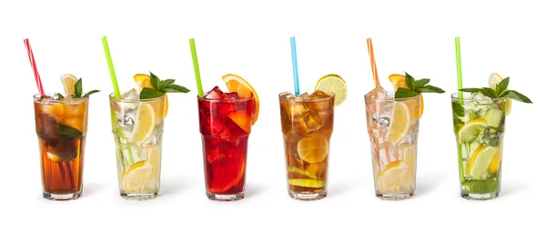 Glasses of fruit drinks with ice cubes — Stock Photo, Image