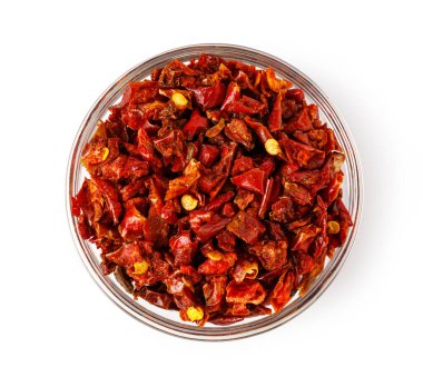 Cam kaseyi dolduran kırmızı kuru kırmızı biber taneleri, yemek ve baharat için mükemmel.