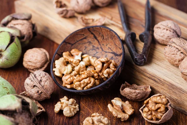 Walnuts on a wooden table — Stock Photo, Image