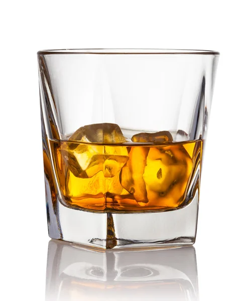 Glass of scotch whiskey and ice on a white background — Stock Photo, Image