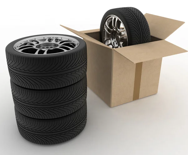 Caja de cartón abierta con neumáticos en blanco — Foto de Stock