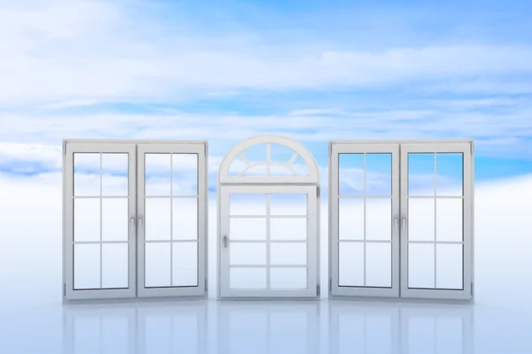 White windows with blue sky and clouds on the background — Stok fotoğraf