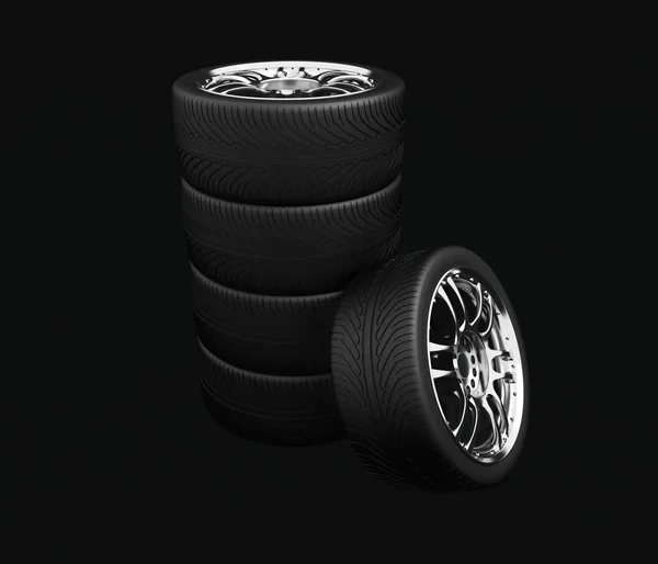 Wheels on black background — Stock Photo, Image