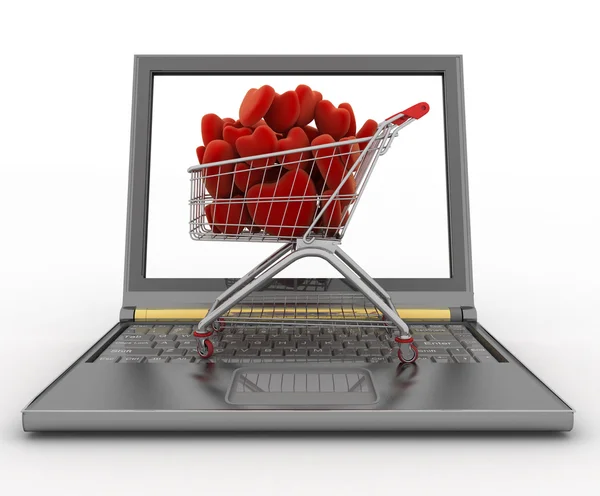 Supermarkt-Einkaufswagen voller roter Herzen auf Laptop — Stockfoto