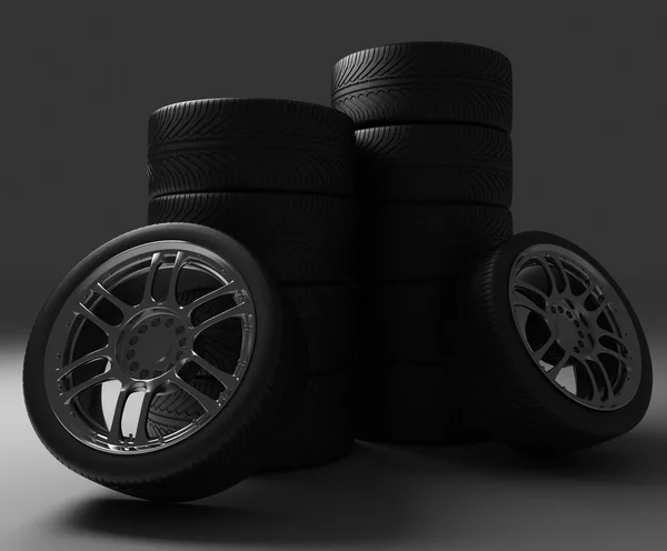 Roues de voiture. Illustration de rendu 3D sur fond noir . — Photo