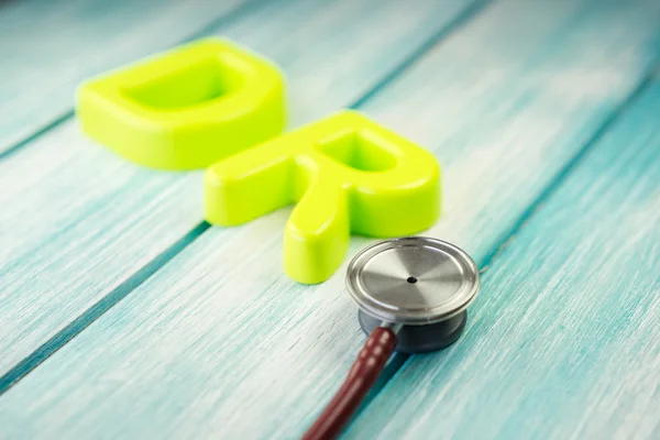 Close-up of two letters DR and stethoscope — Stock Photo, Image