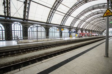 DRESDEN, GERMANY - SEPTEMBER 23: Train station on September 23, 2013 in Dresden, Germany. Dresden Central station was opened in 1898.