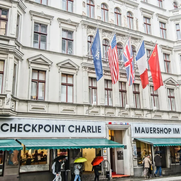 BERLIN, GERMANY - SEPTEMBER 20:   Checkpoint Charlie on September 20, 2013 in Berlin, Germany. It's the best-known Berlin Wall crossing point between East and West Berlin during the Cold War.