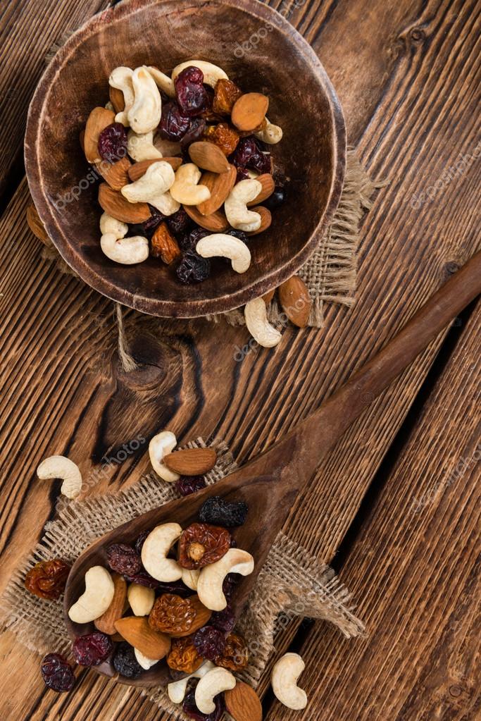 Portion of mixed nuts and fruits — Stock Photo © HandmadePicture 100645728