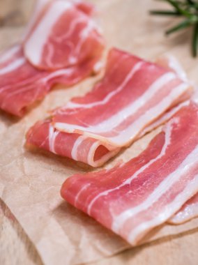 raw Bacon on table clipart