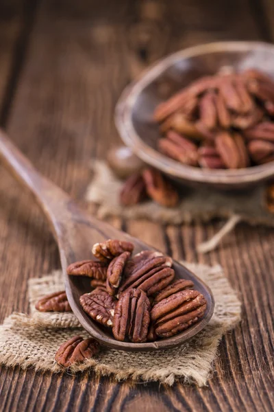 Some Pecan Nuts on table — Stock Photo, Image