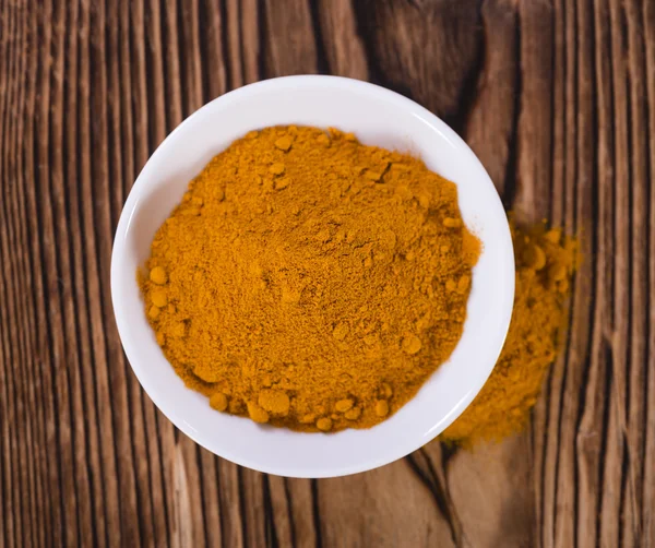 Turmeric  on an old wooden table — Stock Photo, Image