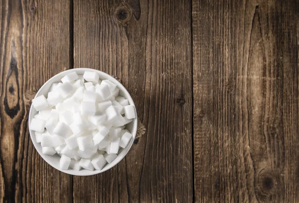 Porción de azúcar blanco en un tazón — Foto de Stock