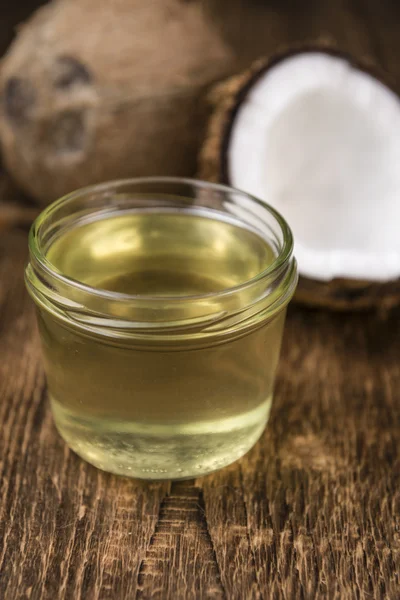 Table with a portion of Coconut Oil — Stock Photo, Image