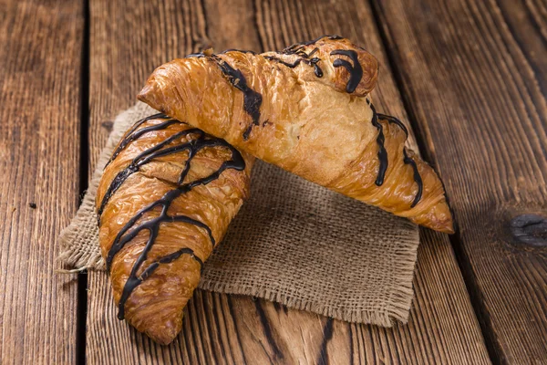 Édes croissant a csokoládét — Stock Fotó