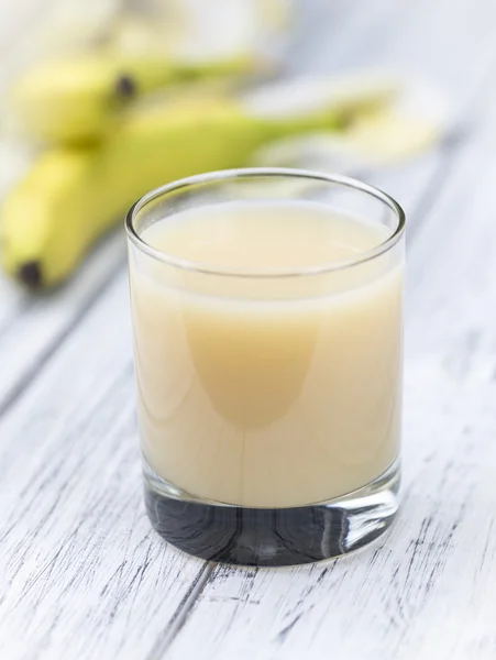 Banana juice on table — Stock Photo, Image
