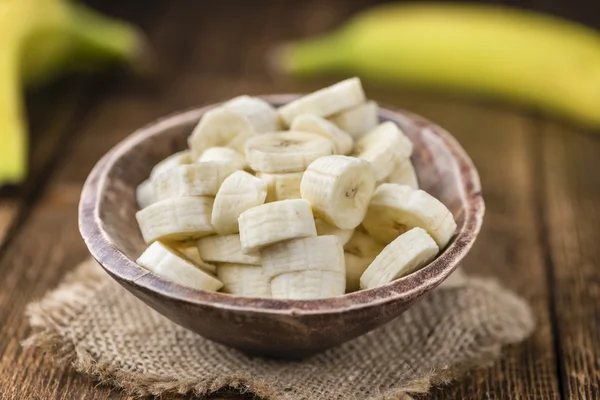 Sliced Bananas  on wooden table — Stock Photo, Image