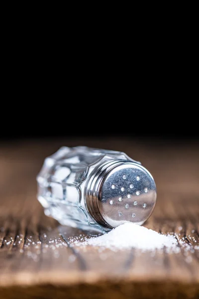 Salt Shaker on table — Stock Photo, Image