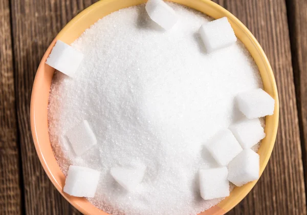 Azúcar blanco en la mesa — Foto de Stock