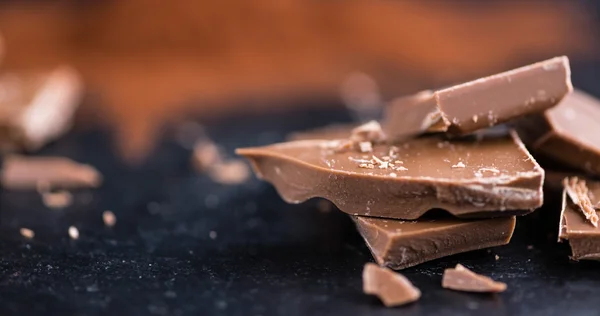 Milk Chocolate on slate — Stock Photo, Image