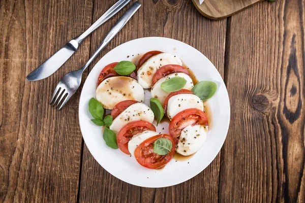 Porción de Mozarella con Tomates —  Fotos de Stock