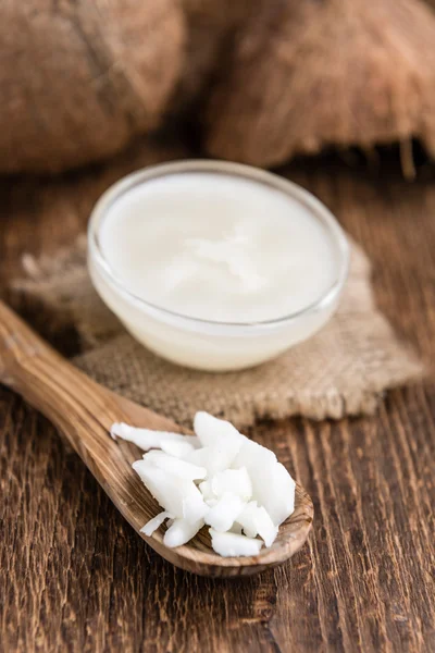 Mesa con una porción de aceite de coco — Foto de Stock