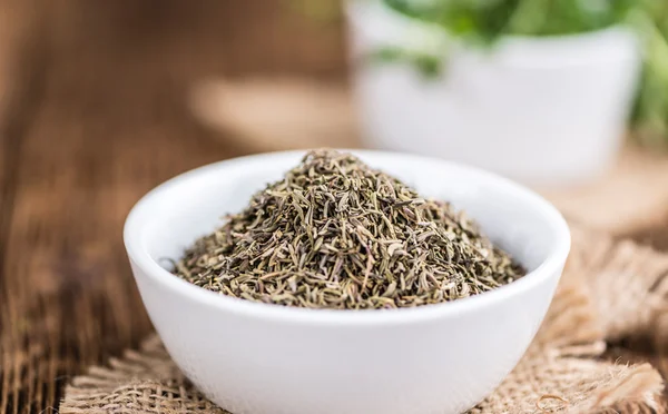 Dried Thyme on wooden table — Stock Photo, Image