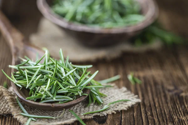 Fresh Rosemary on wooden background — Stock Photo, Image