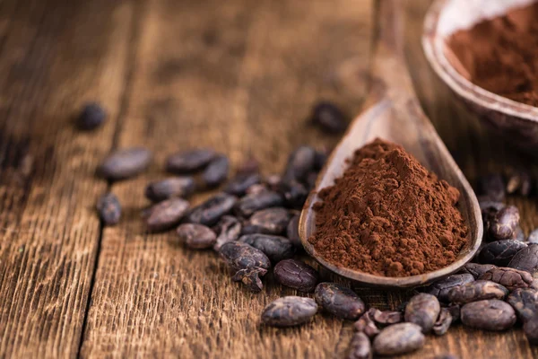 Cocoa powder on table — Stock Photo, Image