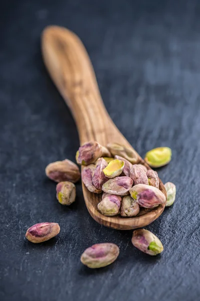 Pistachio Kernels on spoon — Stock Photo, Image