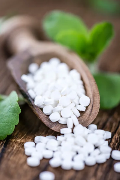 Mesa con píldoras edulcorantes Stevia — Foto de Stock