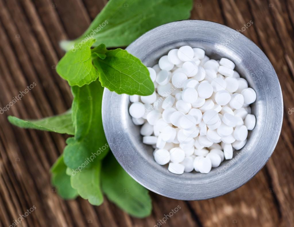 Table with Stevia sweetener pills Stock Photo by ©HandmadePicture 110961714