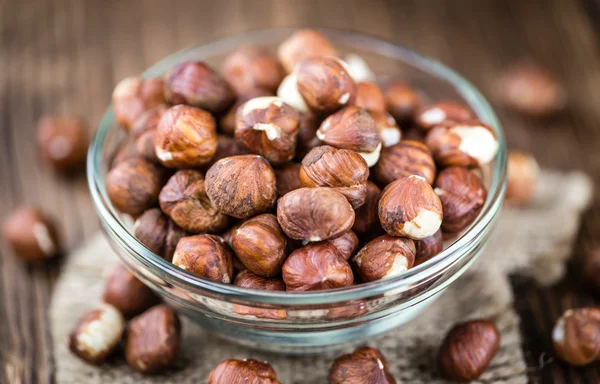 Dried Hazelnuts in bowl — Stock Photo, Image