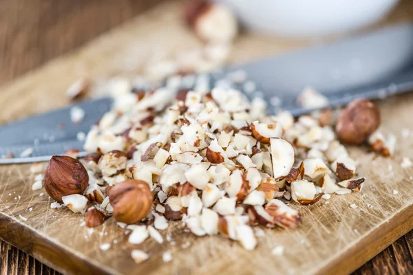 Porción de avellanas picadas — Foto de Stock