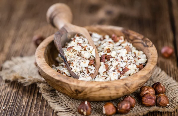 Cutted Hazelnuts in bowl — Stock Photo, Image