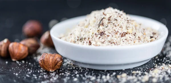 Cutted Hazelnuts in bowl — Stock Photo, Image