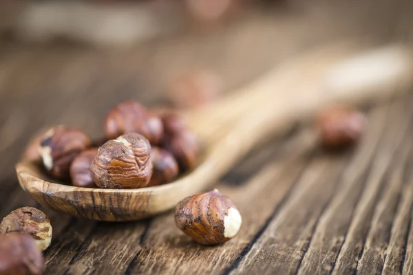 Portion of Hazelnuts on table — Stock Photo, Image