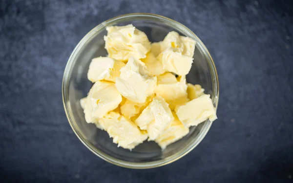 Pieces of Butter in bowl — Stock Photo, Image