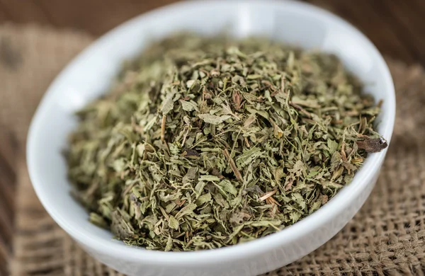 Table with dried Stevia leaves — Stock Photo, Image