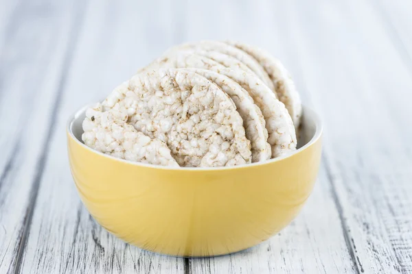 Wooden table with Rice Cakes — Stock Photo, Image