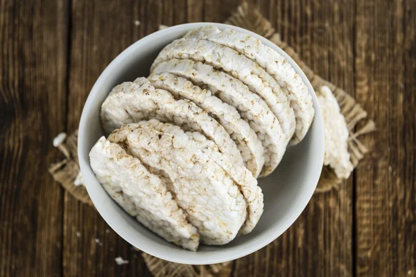 Wooden table with Rice Cakes — Stock Photo, Image