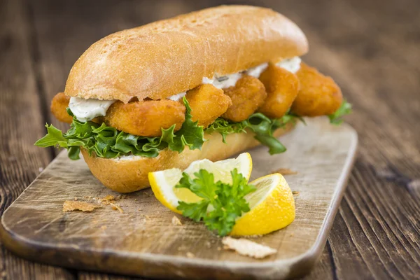 Roll with fried Fish Sticks — Stock Photo, Image