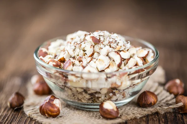 Lískové ořechy na vinobraní pozadí — Stock fotografie