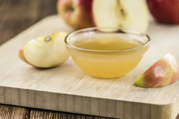 Wooden table with Apple sauce — Stock Photo, Image