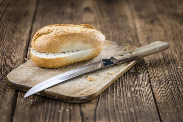 Tavolo in legno con rotolo — Foto Stock