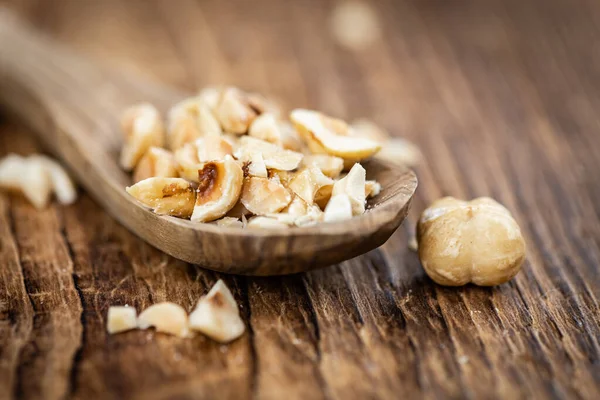 Portion Freshly Chopped Hazelnuts Old Wooden Table Detailed Close Shot — Stock Photo, Image